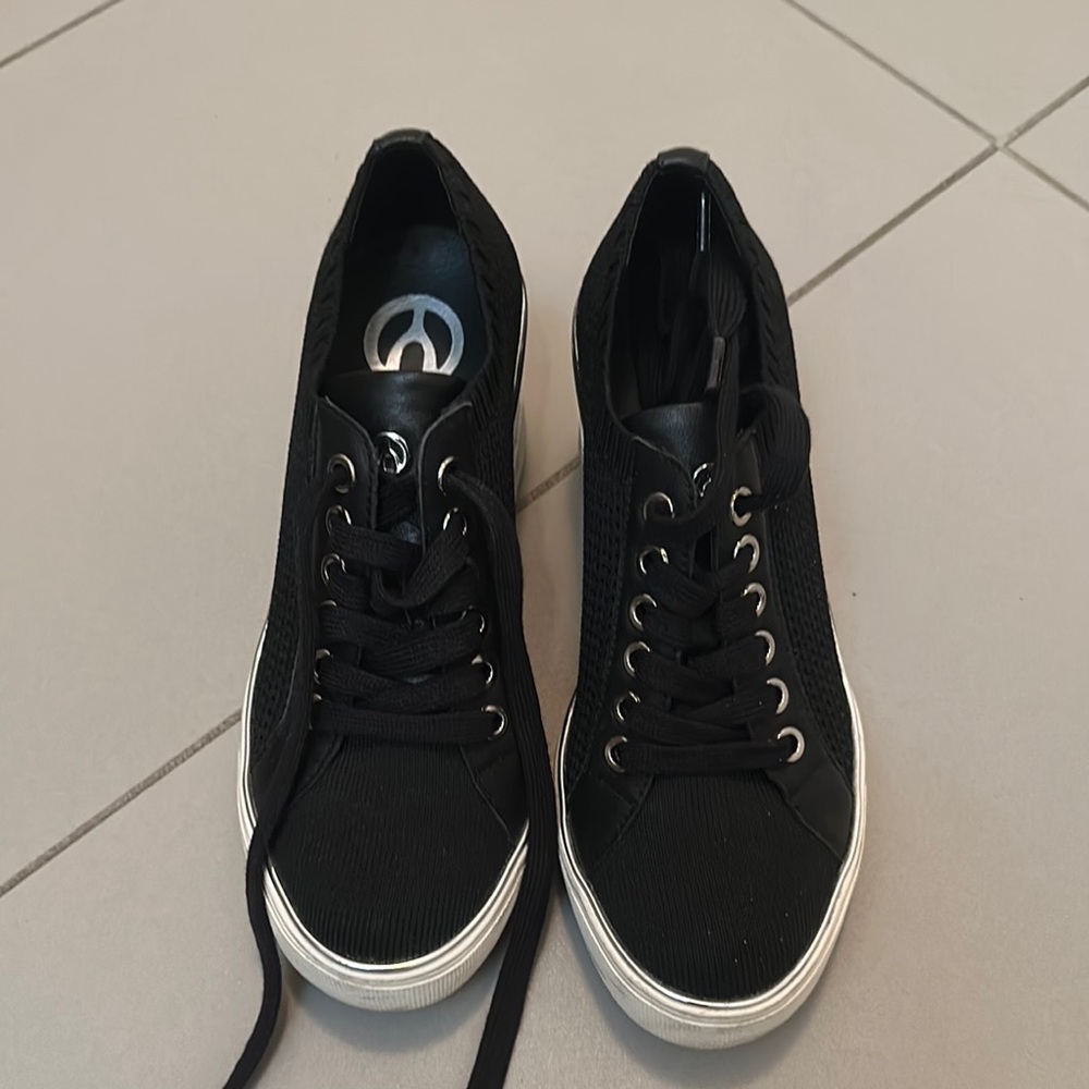 Stylish Black Sneakers with White Sole